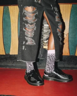 Jorge Leder Mules mit Kontrastnähten in Schwarz